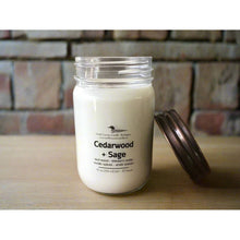 Load image into Gallery viewer, 12 oz Soy Wax Candle scented with Cedarwood + Sage. Copper Mason jar lid and cotton wick.