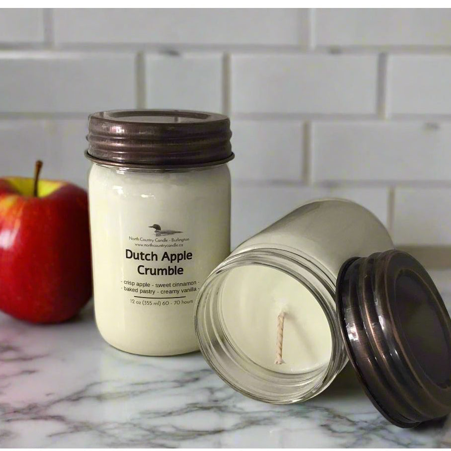 12 oz Soy Wax Candle with cotton wick in glass jar with burnished copper mason jar lid.  Hand-poured and scented with Dutch Apple Crumble fragrance. 
