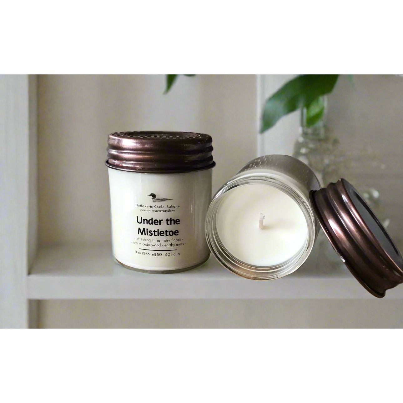 9 oz soy candle with Mason jar lid scented with Under the Mistletoe.