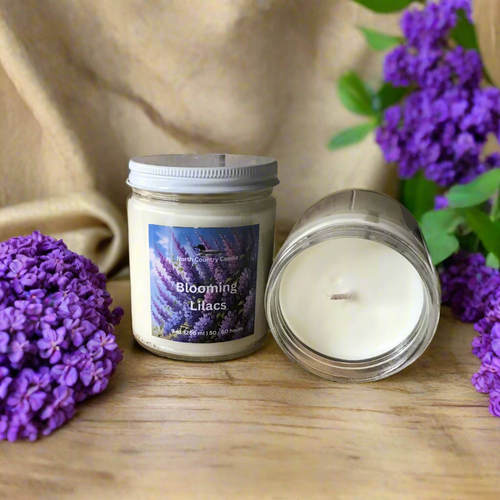 9 oz soy wax candle in clear jar scented with Blooming Lilacs